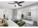 Bright bedroom with a ceiling fan, neutral colors, modern art, and stylish decor at 389 Oglesby Bridge, Conyers, GA 30094