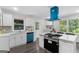 Bright and spacious kitchen with stainless steel appliances and quartz counters at 389 Oglesby Bridge, Conyers, GA 30094