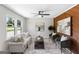 Cozy living room featuring modern decor, a ceiling fan, and an inviting atmosphere at 389 Oglesby Bridge, Conyers, GA 30094