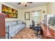 This bedroom features a daybed, desk, and carpet flooring at 6500 Wild Turkey Trl, Riverdale, GA 30296