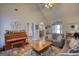 Open living room with view to dining room and foyer, hardwood floors and ample seating at 50 Berkshire Pass, Covington, GA 30016