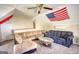 Finished attic area featuring multiple seating areas with patriotic decor at 50 Berkshire Pass, Covington, GA 30016