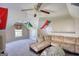 Spacious finished attic featuring a large seating area with natural light at 50 Berkshire Pass, Covington, GA 30016