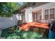 The backyard has a patio, along with grass for outdoor activities, making it a great outdoor space at 1346 Revelstoke Cv, Riverdale, GA 30296