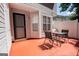 Private outdoor patio with seating, ideal for enjoying the outdoors and relaxing in a fenced-in area at 1346 Revelstoke Cv, Riverdale, GA 30296