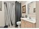Practical bathroom with a sink and shower featuring stylish shower curtain at 226 Long Island Dr, Whitesburg, GA 30185