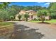 Charming home with a well-manicured lawn and mature trees, offering a picturesque view of the property at 226 Long Island Dr, Whitesburg, GA 30185