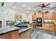 Open kitchen with granite countertops, wood cabinets, and built-in appliances at 226 Long Island Dr, Whitesburg, GA 30185