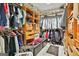 Spacious walk-in closet with custom shelving and plenty of storage for clothes and accessories at 226 Long Island Dr, Whitesburg, GA 30185