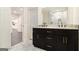 Bathroom featuring marble floors, granite counters, and a double sink vanity at 523 Mount Zion, Hapeville, GA 30354