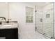 Stylish bathroom featuring marble floors, granite counters, and a glass walk-in shower at 523 Mount Zion, Hapeville, GA 30354