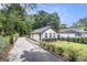 Exterior of home features siding, landscaping, and long driveway at 523 Mount Zion, Hapeville, GA 30354