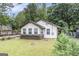 Charming home with a well-maintained lawn and mature trees at 523 Mount Zion, Hapeville, GA 30354