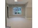 Bright bedroom featuring a window with a view of the outside and plush carpet at 2360 Barrington Trace Sw Cir, South Fulton, GA 30331