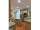 Spacious kitchen featuring wooden cabinets, stainless steel refrigerator and center island at 2360 Barrington Trace Sw Cir, South Fulton, GA 30331