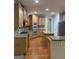 Well-equipped kitchen with stainless steel appliances, wooden cabinets and granite countertops at 2360 Barrington Trace Sw Cir, South Fulton, GA 30331