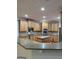Gourmet kitchen with custom cabinets, stainless appliances, and granite counters at 2360 Barrington Trace Sw Cir, South Fulton, GA 30331