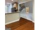 Open concept kitchen features modern stainless steel appliances and a breakfast bar at 2360 Barrington Trace Sw Cir, South Fulton, GA 30331