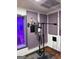A look inside the music studio's recording booth, featuring a microphone, speakers, and a window at 2360 Barrington Trace Sw Cir, South Fulton, GA 30331