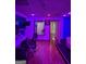 Recording studio with hardwood floors, a vocal booth, and mixing desk with two chairs at 2360 Barrington Trace Sw Cir, South Fulton, GA 30331