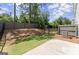 Backyard with dark wood fence, a small yard, and a concrete patio at 3349 Verdi Ln, Kennesaw, GA 30144