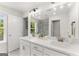 Bathroom with marble floors, double sink vanity with white cabinets, and glass enclosed shower at 3349 Verdi Ln, Kennesaw, GA 30144