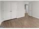 Bedroom with hardwood floors and a closet with doors at 3349 Verdi Ln, Kennesaw, GA 30144
