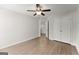 Bright bedroom with a ceiling fan and walk in closet and neutral-toned flooring at 3349 Verdi Ln, Kennesaw, GA 30144