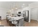 Modern kitchen featuring a large center island with pendant lighting and stainless steel appliances at 3349 Verdi Ln, Kennesaw, GA 30144