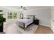 Serene main bedroom with natural light, a ceiling fan, and neutral decor at 3349 Verdi Ln, Kennesaw, GA 30144