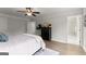 Bright main bedroom features a ceiling fan, a dresser, and an attached bathroom at 3349 Verdi Ln, Kennesaw, GA 30144