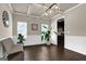 Cozy dining area with coffered ceilings and elegant lighting at 675 Mallard Cv, Loganville, GA 30052