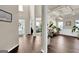 Stunning entryway with hardwood floors and natural light coming through the door at 675 Mallard Cv, Loganville, GA 30052