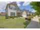 Beautiful home with lush green lawn and neatly trimmed landscaping at 675 Mallard Cv, Loganville, GA 30052
