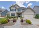 Charming two-story home with well-manicured lawn and inviting front entrance at 675 Mallard Cv, Loganville, GA 30052