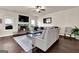 Bright living room with a stone fireplace, comfortable sofas, and contemporary decor at 675 Mallard Cv, Loganville, GA 30052