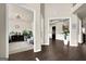 Inviting living room with hardwood floors, plants and doorway at 675 Mallard Cv, Loganville, GA 30052
