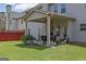 Inviting outdoor patio with a dining table, chairs, and potted plants for relaxed outdoor living at 675 Mallard Cv, Loganville, GA 30052