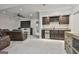 Finished basement with a wet bar, wine storage, and mini refrigerator at 210 Short Rd, Sharpsburg, GA 30277