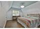 Charming bedroom with a unique bedframe and a colorful, eye catching quilt at 210 Short Rd, Sharpsburg, GA 30277