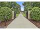 Secure gated entrance with stone pillars, providing privacy and a sense of exclusivity to the estate at 210 Short Rd, Sharpsburg, GA 30277