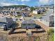 Aerial view of suburban homes with well-maintained lawns in a picturesque neighborhood at 10736 Southwood Dr, Hampton, GA 30228