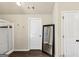 Bright bathroom with a glass shower, wood floors and a decorative mirror at 10736 Southwood Dr, Hampton, GA 30228