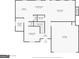 A floor plan showcasing the layout of the first floor with kitchen, living room, garage and other living spaces at 10736 Southwood Dr, Hampton, GA 30228