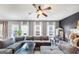 Spacious living room featuring modern decor, comfortable seating, and lots of natural light at 10736 Southwood Dr, Hampton, GA 30228