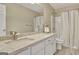 Bathroom features a granite countertop, tile floors, and shower at 500 Merrill Ln, Peachtree City, GA 30269