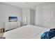 Well-lit bedroom features a ceiling fan and an adjacent mirror at 500 Merrill Ln, Peachtree City, GA 30269
