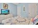 Well-lit bedroom features white painted trim and neutral walls at 500 Merrill Ln, Peachtree City, GA 30269
