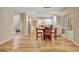 Open concept dining area featuring a round table, chairs, and access to the kitchen and backyard at 500 Merrill Ln, Peachtree City, GA 30269