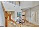 Bright foyer with hardwood floors, staircase, and a view of the upstairs at 500 Merrill Ln, Peachtree City, GA 30269